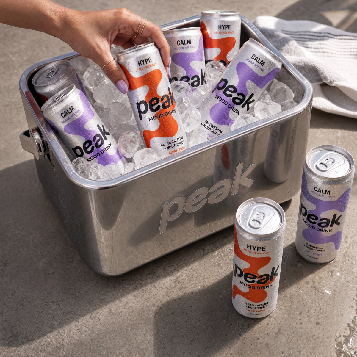 Peak Hype and Calm cans in an ice bucket
